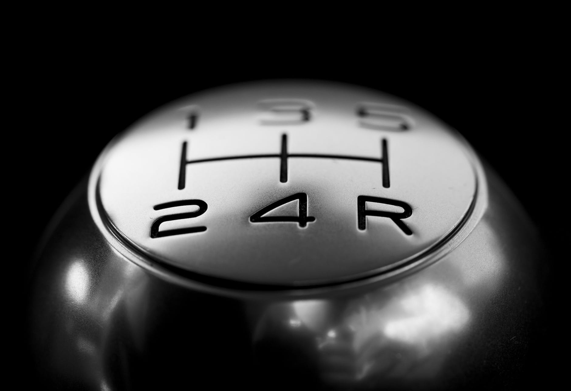 close up photo of stainless shift knob