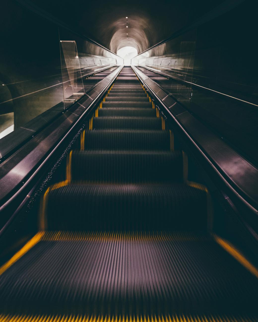 low angle photography of escalator