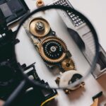 shallow focus photography of magnifying glass with black frame